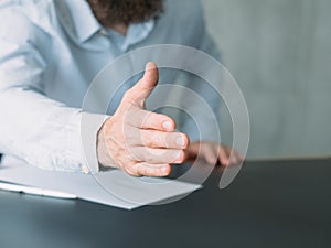 Business man outstretching hand greeting job hire