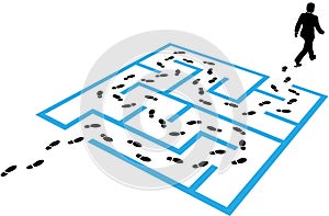 Business man path footprints solution puzzle