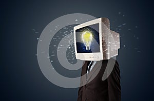 Business man with a pc monitor head and idea light bulb in the d