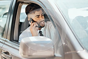 Business man, phone call and driving in car for communication, mobile networking and chat in traffic. Indian male worker