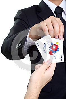 Business man picks card joker in isolated