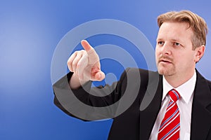 Business man pointing on copy space