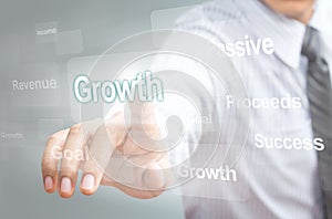 Business man pointing growth concept