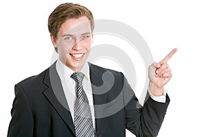 Business man pointing showing copy space