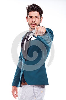 Business man pointing at something interesting on a white