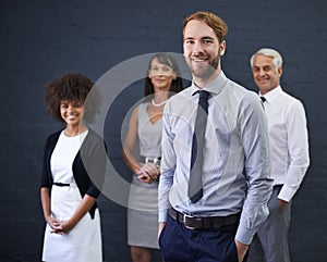 Business man, portrait and confident for career opportunity, studio and happy on wall background. Male person