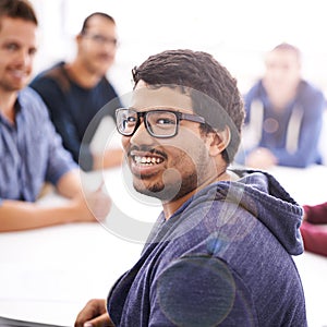 Business man, portrait and meeting in creative office for planning and collaboration in lens flare. Face of young worker