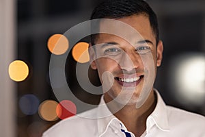 Business man portrait, smile and night working of a accountant worker ready for late financial job. Corporate