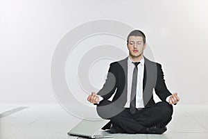 Business man practice yoga at network server room photo