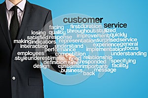 Business man presenting wordcloud related to customer service