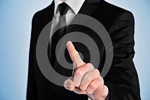 Business man press something