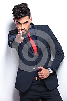 Business man pretends to shoot you