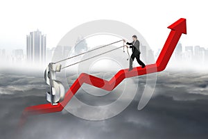 Business man pulling 3D dollar sign upward red trend line