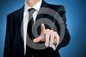 Business man pushing button