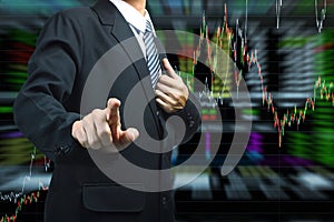 Business man pushing with stock market graph background