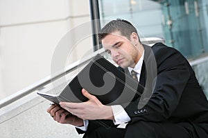 Business Man Reading