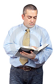 Business man reading a book