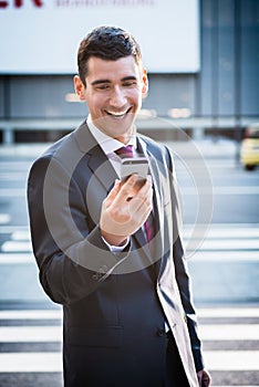 Business man reading email on phone