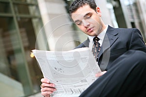 Business Man Reading Newspaper