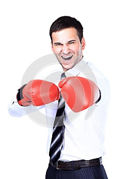 Business man ready to fight with boxing gloves