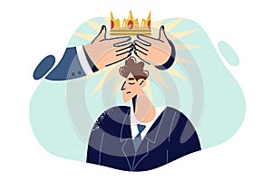 Business man receives golden crown from hands of boss as sign of gratitude for achieving success