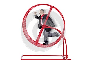 Business Man Running In A Hamster Wheel