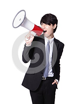 Business man screaming loudly in a megaphone