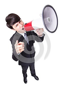 Business man screaming loudly in a megaphone