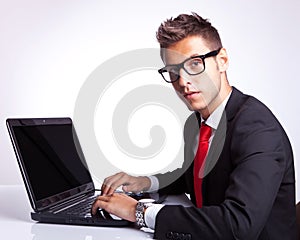 Business man Seated at Computer