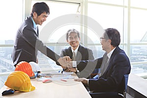 Business man shaking hand after successful project solution plan