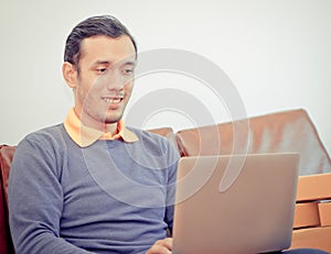 Business man shocking looking at Laptop computer