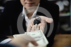 Business man show money bank note make financial plan invite people to sell or buy house and car