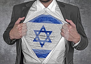 Business man show t-shirt flag of Israel rips open his shirt