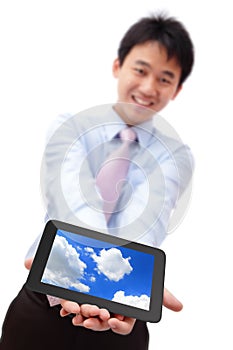 Business man show tablet pc with smile