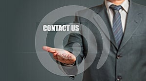 Business Man Showing Contact Us Sign