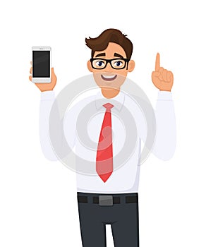 Business man showing/holding a new brand, latest smartphone screen, cell, mobile phone in hand and pointing finger up or gesturing