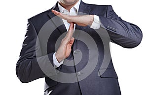 Business man showing time out sign