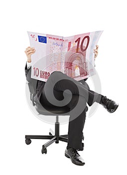 Business man sitting on a chair with euro currency