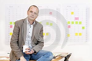 Business man sitting on his desk