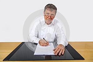 Business man sitting at his desk