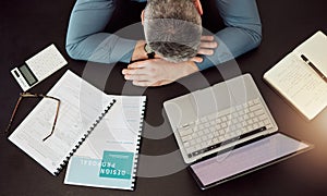 Business man, sleep and desk in top view with laptop, documents and working overtime for design proposal. Web developer