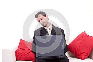 Business man sleeping on chouch