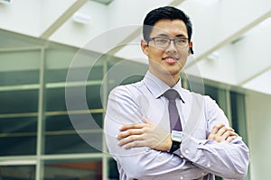 Business Man With Smartwatch And Bluetooth Handsfree Device