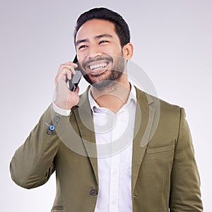 Business man, smile and phone call in studio for communication and networking on gray background. Asian male