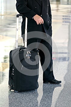 Business man standing in the airport