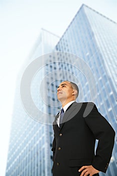 Business Man Standing By His Office Building