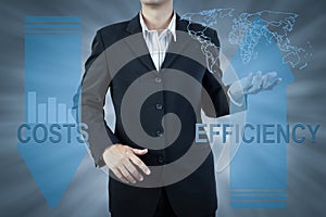 Business man standing and presents cost and efficiency, finance