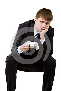 Business Man in suit playing xbox games photo