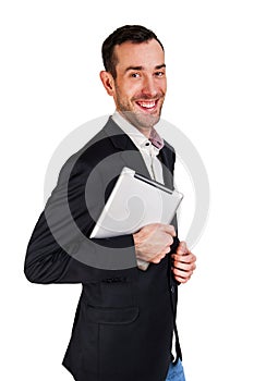 Business man in suit with tablet smiling, isolated over white.