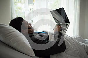 Business man with suit working with oxygen mask in the office. Sick man work in the office